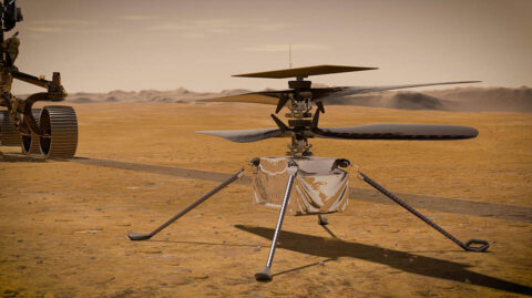 In this illustration, NASA's Ingenuity Mars Helicopter stands on the Red Planet's surface as NASA's Perseverance rover (partially visible on the left) rolls away. (NASA/JPL-Caltech) In this illustration, NASA's Ingenuity Mars Helicopter stands on the Red Planet's surface as NASA's Perseverance rover (partially visible on the left) rolls away. (NASA/JPL-Caltech)