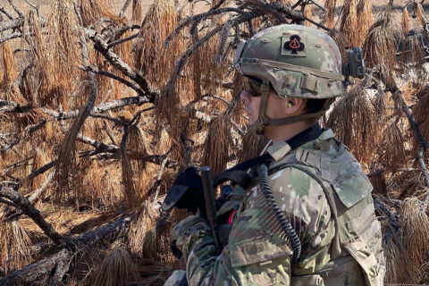 U.S. Army Staff Sgt. Erick Colon, Squad Leader, Able Company, 1st Battalion, 506th Infantry Regiment “Red Currahee”, 1st Brigade Combat Team “Bastogne”, 101st Airborne Division (Air Assault) looking at the objective prior to maneuvering his squad on Fort Polk, Louisiana during a live fire exercise Feb. 21.  (U.S. Army Photo by Maj. Vonnie Wright)