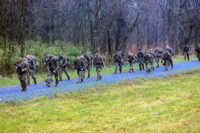 Squad Leaders from 1st Battalion, 506th Infantry Regiment “Red Currahee”, 1st Brigade Combat Team “Bastogne”, 101st Airborne Division (Air Assault), conduct a culminating foot march during Toccoa Tough II, a leadership professional development course March 8-12, on post. (Sgt. Lynnwood Thomas)