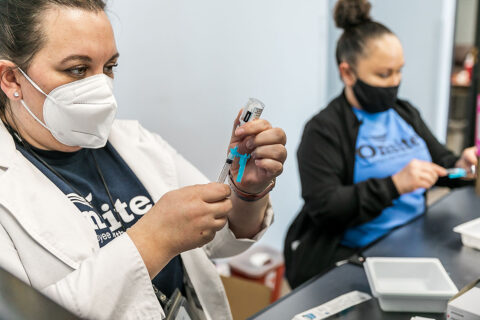 Onsite nurse prepares to administer Moderna COVID-19 vaccine to CMCSS employee.