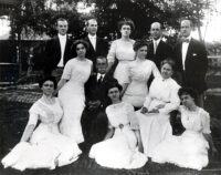 The Bringhurst Family:  Lulu (seated far left), her parents Billie and Sallie, and 9 siblings