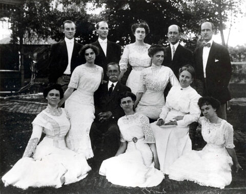 The Bringhurst Family: Lulu (seated far left), her parents Billie and Sallie, and 9 siblings