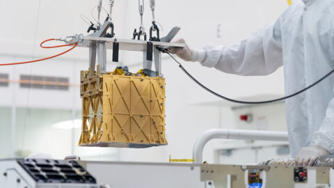 Technicians at NASA’s Jet Propulsion Laboratory lower the Mars Oxygen In-Situ Resource Utilization Experiment (MOXIE) instrument into the belly of the Perseverance rover. (NASA/JPL-Caltech) Technicians at NASA’s Jet Propulsion Laboratory lower the Mars Oxygen In-Situ Resource Utilization Experiment (MOXIE) instrument into the belly of the Perseverance rover. (NASA/JPL-Caltech)