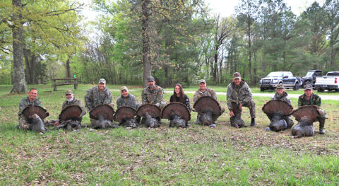 Members from the turkey hunt pose for a group picture to show off what they tagged during the annual hunt hosted by the Military Officers Association of America here April 17th, 2021. (Sgt. 1st Class Jacob Connor, 101st Airborne Division)