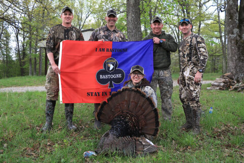 Spc. Faith Breeden (Center) poses with her prize turkey and other servicemembers from 1st Brigade Combat Team "Bastogne," 101st Airborne Division (Air Assault) after the completion of this year’s annual turkey hunt here April 17th, 2021. (Sgt. 1st Class Jacob Connor, 101st Airborne Division)