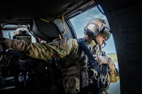 An aircrew member looks over as Nashville Fire Department’s Helicopter-borne Aquatic Rescue Team performs a water rescue mission during a joint exercise near Smyrna’s National Guard Volunteer Training Site, April 9th. (Deputy Communications Director Justin Lane, Office of the Governor) 