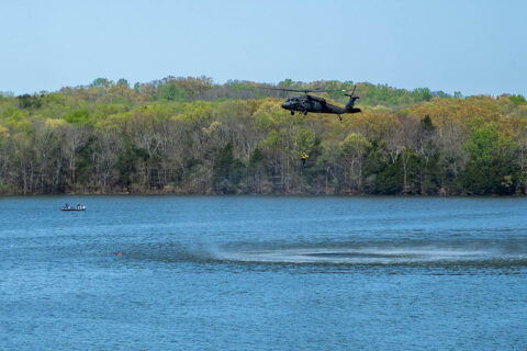 Tennessee National Guard’s UH-60L Blackhawk and Nashville Fire Department’s Helicopter-borne Aquatic Rescue Team perform a water rescue mission during a joint exercise near Smyrna’s National Guard Volunteer Training Site, April 9th. (Deputy Communications Director Justin Lane, Office of the Governor) 