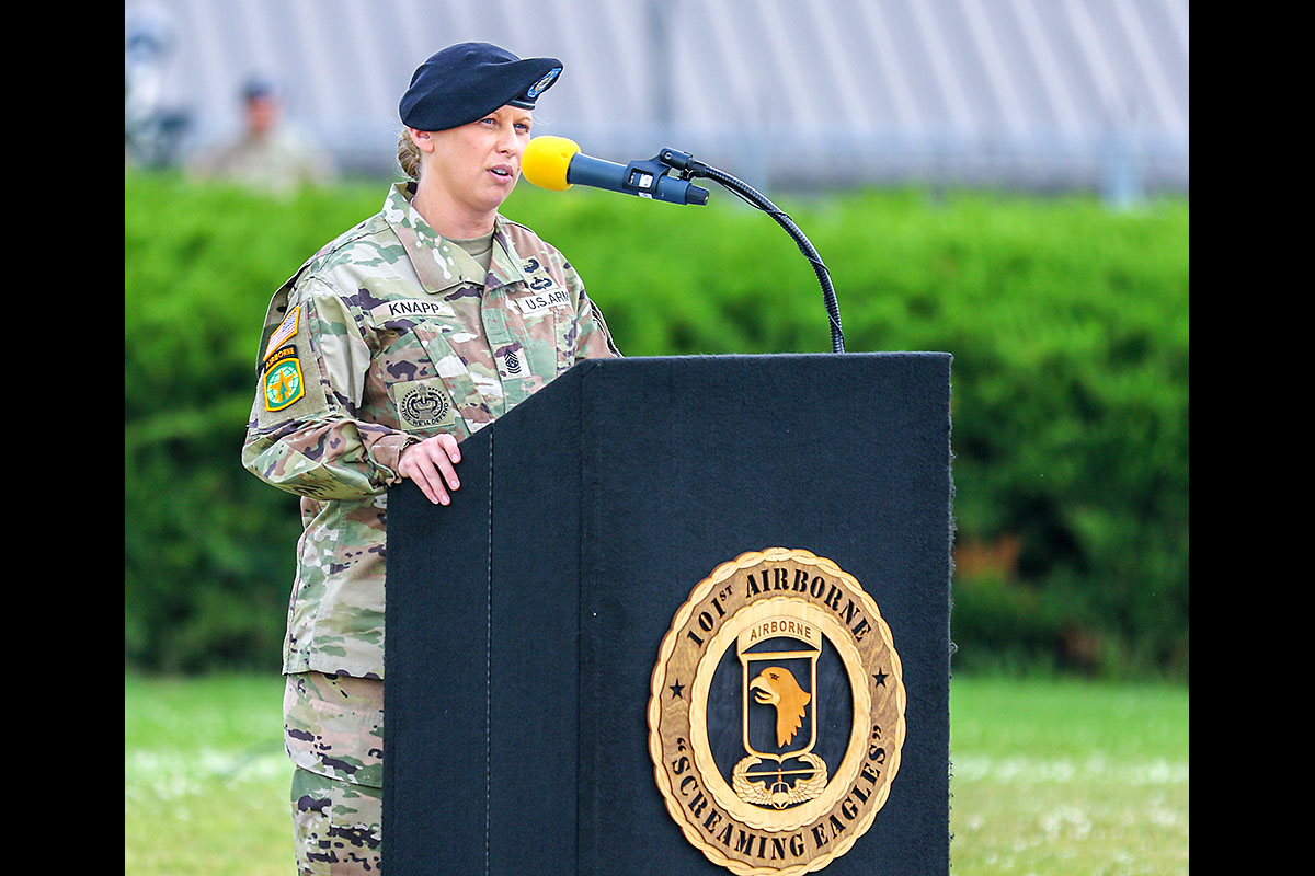 Command Sgt. Maj. Veronica Knapp, incoming division command sergeant major of the 101st Airborne Division (Air Assault), gives her remarks during the division change of responsibility, May 27th, 2021, at the division headquarters, Fort Campbell, KY. (Spc. John Simpson, 40th Public Affairs Detachment)