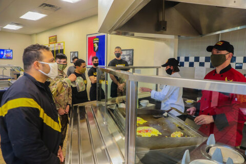 Colonel Robert Born, commander, 1st Brigade Combat Team, 101st Airborne Division (Air Assault), is ready to take the next omelet order at the grill May 14th during breakfast service in Snipes Dining Facility. Culinary experts in Snipes Dining Facility prepare meals for more than 3,000 Soldiers in the brigade every day to ensure the sustainment and readiness of the force. (Sgt. Lynnwood Thomas, 1st Brigade Combat Team, 101st Airborne Division) Colonel Robert Born, commander, 1st Brigade Combat Team, 101st Airborne Division (Air Assault), is ready to take the next omelet order at the grill May 14th during breakfast service in Snipes Dining Facility. Culinary experts in Snipes Dining Facility prepare meals for more than 3,000 Soldiers in the brigade every day to ensure the sustainment and readiness of the force. (Sgt. Lynnwood Thomas, 1st Brigade Combat Team, 101st Airborne Division)