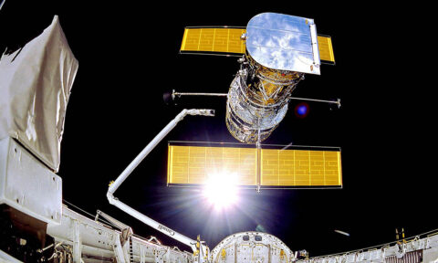The Hubble Space Telescope is deployed on April 25th, 1990 from the space shuttle Discovery. Avoiding distortions of the atmosphere, Hubble has an unobstructed view peering to planets, stars and galaxies, some more than 13.4 billion light years away. (NASA/Smithsonian Institution/Lockheed Corporation) The Hubble Space Telescope is deployed on April 25th, 1990 from the space shuttle Discovery. Avoiding distortions of the atmosphere, Hubble has an unobstructed view peering to planets, stars and galaxies, some more than 13.4 billion light years away. (NASA/Smithsonian Institution/Lockheed Corporation)