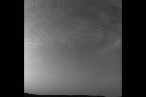 NASA's Curiosity rover captured this drifting clouds image on May 7th, 2019, the 2,400th Martian day, or sol, of the mission. Curiosity used its black-and-white Navigation Cameras to take the photo. (NASA/JPL-Caltech)