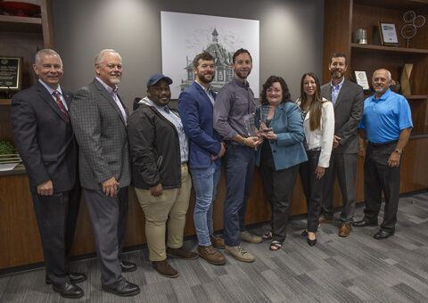 (L-R) Clarksville Mayor Joe Pitts; General Manager of CDE Lightband, Brian Taylor; Energy Services Specialist at CDE Lightband, Levon Gibson; Energy Services Specialist at CDE Lightband, Robert Denson; Energy Services Manager at CDE Lightband, John Jackson; Vice President of TVA EnergyRight, Cynthia Herron; Program Manager of TVA EnergyRight, Bethany Kitch; Customer Service Manager of TVA, Lynn Huffstetler; Board Chairman of CDE Lightband, Ron Jackson.