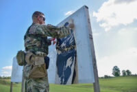 A member of the Tennessee National Guard takes down a target at a rifle range, June 27th, during the TAG Match, at Tullahoma’s Volunteer Training Site. The TAG Match is an annual marksmanship competition and training event that is hosted by the Tennessee Combat Marksmanship Program. (Sgt. 1st Class Timothy Cordeiro)