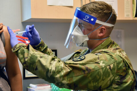 Spc. Anthony Spencer with the Tennessee National Guard gives a vaccination to a patient at the Trousdale County Health Department on June 9th. (Lt. Col. Darrin Haas, Tennessee National Guard)