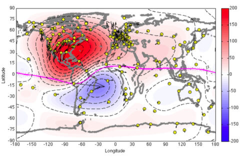 A map of the ionospheric currents at the time of Dynamo 1’s launch on July 4, 2013. Currents – whose intensity is marked by red and blue coloring – travel in opposite directions on either side of the magnetic equator, marked with a pink line. The yellow dots are magnetometer readings from the ground. (NASA/JAXA/R. Pfaff et al)