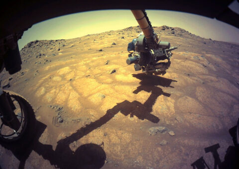 The robotic arm on NASA’s Perseverance rover reached out to examine rocks in an area on Mars nicknamed the “Cratered Floor Fractured Rough” area in this image captured on July 10th, 2021 (the 138th sol, or Martian day, of its mission). (NASA/JPL-Caltech) The robotic arm on NASA’s Perseverance rover reached out to examine rocks in an area on Mars nicknamed the “Cratered Floor Fractured Rough” area in this image captured on July 10th, 2021 (the 138th sol, or Martian day, of its mission). (NASA/JPL-Caltech)
