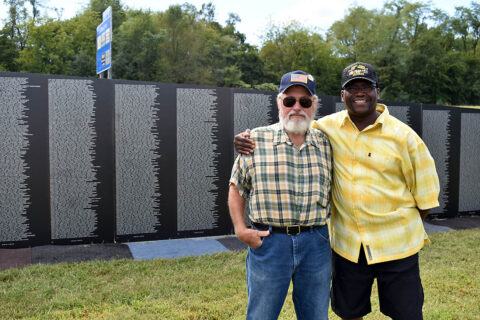 Veterans by the Vietnam Memorial Wall.