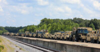 Soldiers assigned to 3rd Brigade Combat Team, 101st Airborne Division (Air Assault) stage their vehicles onto the Fort Campbell Railhead August 10th as they prepare to ship them out to Port Charleston, SC for their Sea Emergency Deployment Readiness Training Exercise. (Spc. Jacob Wachob, 40th Public Affairs Detachment)