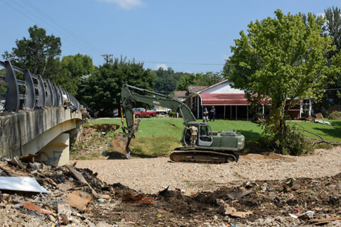 Soldiers and Airmen from the Tennessee National Guard conduct cleanup operations in Waverly, Aug. 26, following deadly flooding last weekend. (Retired Sgt. 1st Class Edgar Castro)