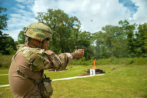 A member of the Tennessee National Guard fires an M17 pistol, Aug. 20, during the TAG Pistol Match at Tullahoma’s Volunteer Training Site. The TAG Match is an annual marksmanship competition and training event hosted by the Tennessee Combat Marksmanship Program. (Pfc. Olivia Gum) A member of the Tennessee National Guard fires an M17 pistol, Aug. 20, during the TAG Pistol Match at Tullahoma’s Volunteer Training Site. The TAG Match is an annual marksmanship competition and training event hosted by the Tennessee Combat Marksmanship Program. (Pfc. Olivia Gum)