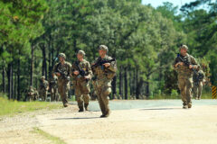 Soldiers of Bravo Company, 1-187 Infantry Regiment “Leader”, 3rd Brigade Combat Team, 101st Airborne Division (Air Assault) secure a foothold in a small town in Fort Polk, Louisiana, JRTC. The Joint Readiness Training Center (JRTC) focuses on improving unit readiness by providing realistic, stressful, joint, and combined arms training. (Spc. Jordy Harris, 101st Airborne Division)