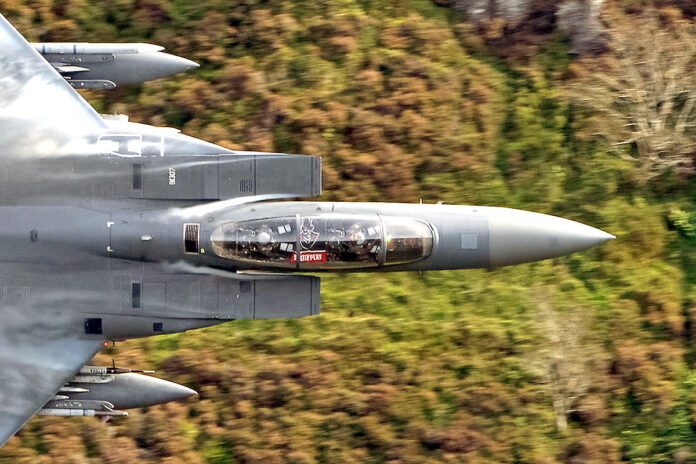 Austin Peay State University alum Captain Branden Clifton has the APSU Governors' flag in the cockpit of a F-15E Strike Eagle during flight, Tuesday. (Ed butcher)