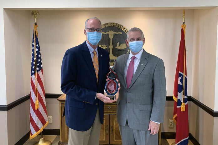 (L to R) Bill Harpel and Clarksville Mayor Joe Pitts with the Ron Smithfield Persistence Award.