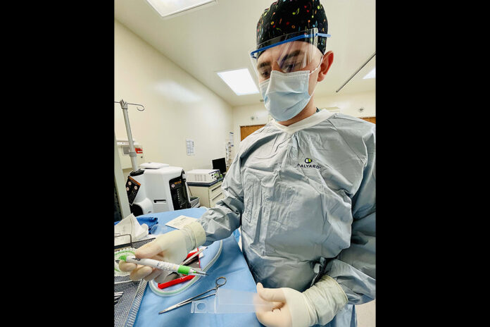 Blanchfield Army Community Hospital Operating Room Specialist Spc. Brandon Trevathan displays an electrosurgery generator equipped with a smoke evacuation system. The Association of Perioperative Nurses recently awarded the hospital the “Go Clear Award Gold Level” for its efforts to eliminate surgical smoke exposure that occurs during the cauterization process. (U.S. Army photo by Maria Yager)