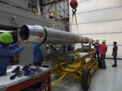 The EVE payload is loaded onto a cart for transport at the White Sands Missile Range. (NASA)