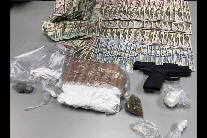 The search found two-pounds of fentanyl, additional unknown white powder, a weapon, and cash were seized. The estimated street value of two-pounds of fentanyl is estimated at $110,000.