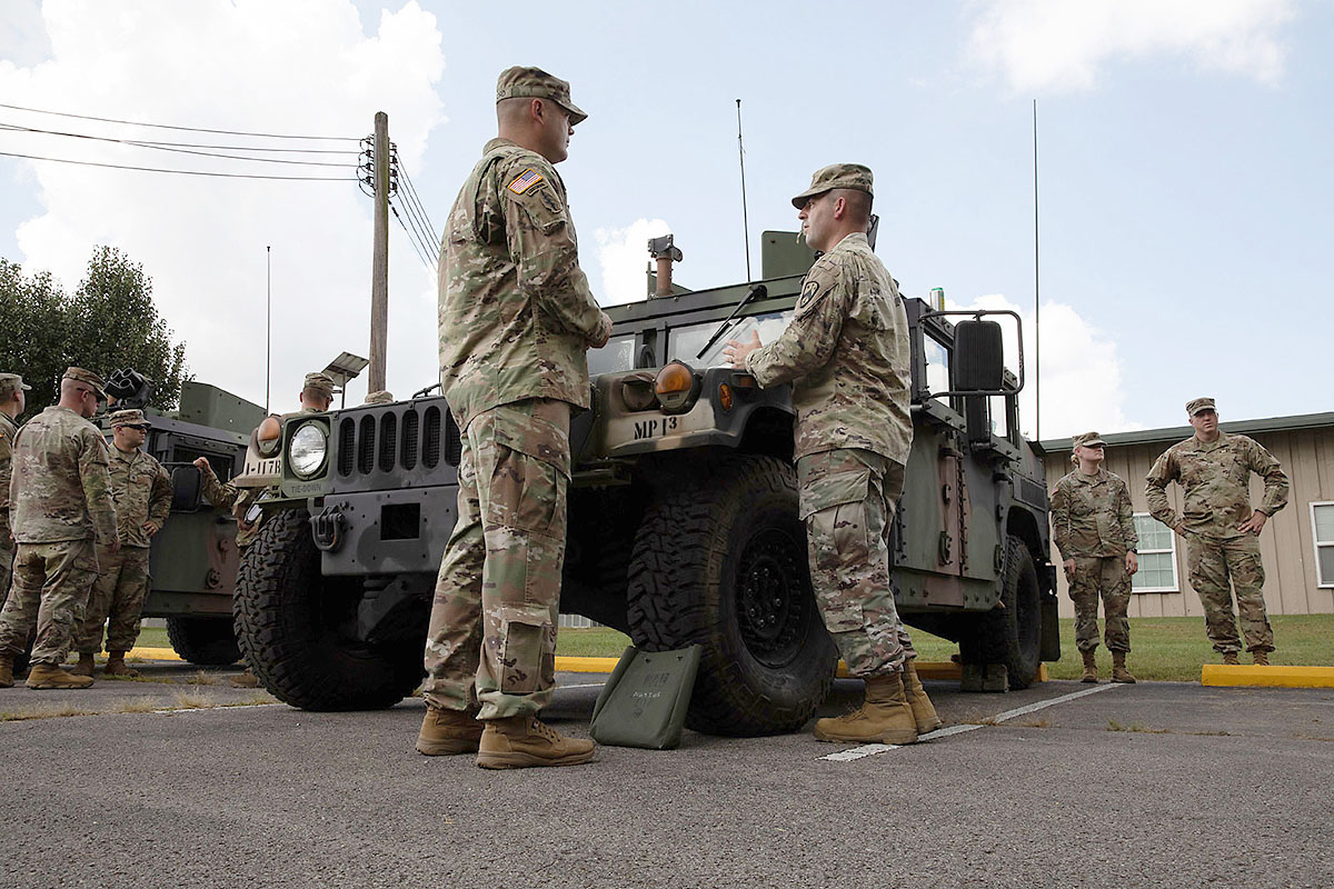 Soldiers with the Tennessee Army National Guard prepare to receive instruction on vehicle preventive maintenance, care and services during the First Line Leadership Course pilot in Smyrna on Sept. 14. The course provided the Soldiers with refreshers on soldiering skills and supplied them with administrative information that they could provide to their units. (Pfc. Olivia Gum) 