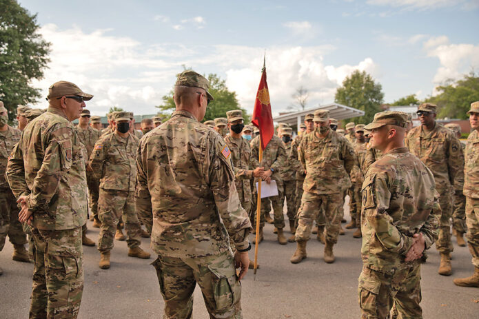 Maj. Gen. Jeff Holmes, Tennessee’s Adjutant General, and Command Chief Master Sgt. Kenneth Simmons, Tennessee’s Senior Enlisted Leader, meet with Soldiers from the 1176th Transportation Company, September 1, at Smyrna’s Volunteer Training Site, prior to the unit’s mobilization to Louisiana. (Staff Sgt. Timothy Cordeiro, Tennessee National Guard Public Affairs)