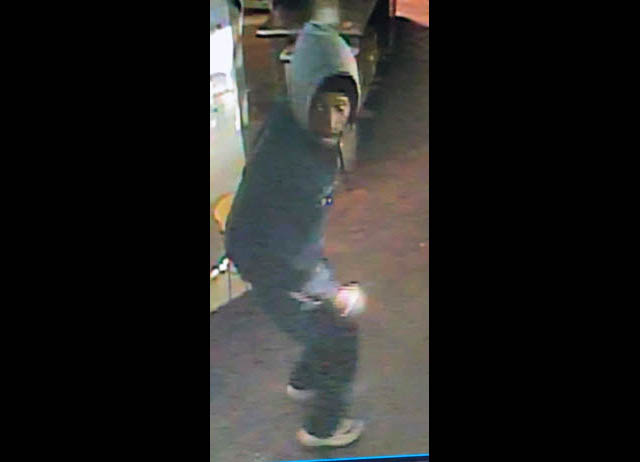 The Clarksville Police Department is requesting the public's help in identifying the Suspect in this photo for the Burglary of the KFC located at 792 North Second Street.