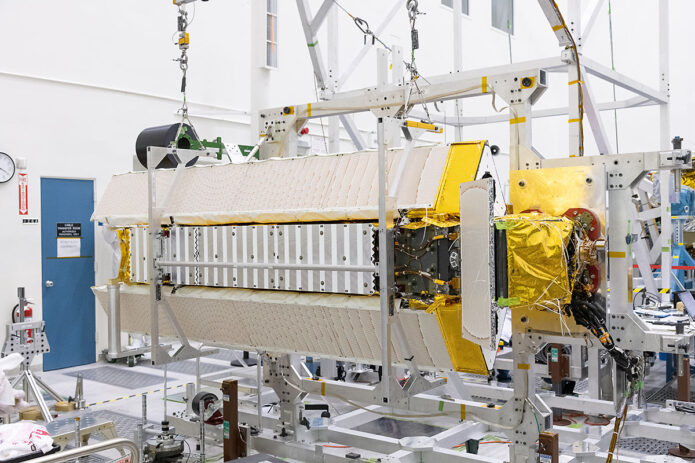 Part of the SWOT satellite’s science instrument payload sits in a clean room at NASA’s Jet Propulsion Laboratory during assembly. By measuring the height of the water in the planet's ocean, lakes, and rivers, researchers can track the volume and location of the finite resource around the world. (NASA/JPL-Caltech)