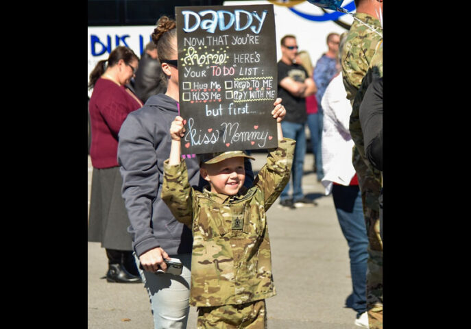 Families, friends and fellow service members gathered to greet Tennessee National Guardsmen as they return home from a year-long deployment, Oct. 27, at Smyrna’s Volunteer Training Site. Members of the 913th Engineer Company, 269th Military Police Company, and C Company, 2nd Battalion, 151st Aviation Regiment were deployed supporting operations near Laredo, Texas. (U.S. Army Sgt. 1st Class Timothy Cordeiro) Families, friends and fellow service members gathered to greet Tennessee National Guardsmen as they return home from a year-long deployment, Oct. 27, at Smyrna’s Volunteer Training Site. Members of the 913th Engineer Company, 269th Military Police Company, and C Company, 2nd Battalion, 151st Aviation Regiment were deployed supporting operations near Laredo, Texas. (U.S. Army Sgt. 1st Class Timothy Cordeiro)