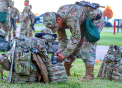 Maj. Tanya Lockett, Division Surgeon, 101st Airborne Division (Air Assault), stages her bag in preparation for loading onto a CH-47 Chinook helicopter Nov. 1, 2021, outside Headquarters and Headquarters Battalion, Fort Campbell, Ky. Lockett flew in chalk three of four as part of the air assault movement of division staff and HHBn Soldiers out to the Nov. exercise location. (Spc. John Simpson, 40th Public Affairs Detachment)