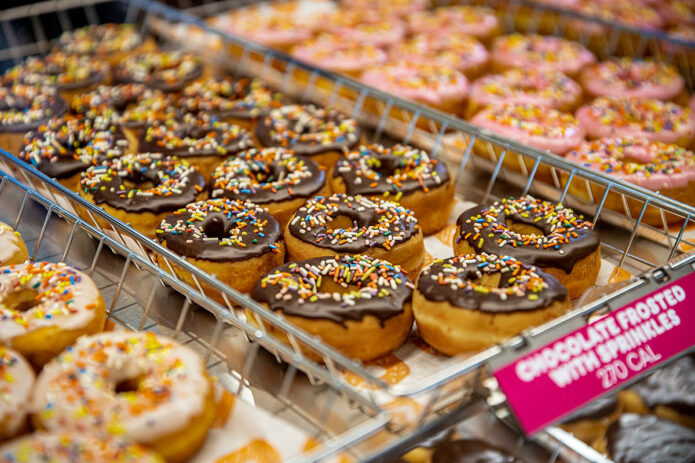 Dunkin' Chocolate Frosted Donuts with Sprinkles.