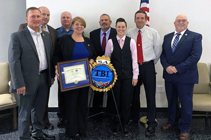 Investigator Angela Christian with the Montgomery County Sheriff's Office graduates from the TBI State Academy.