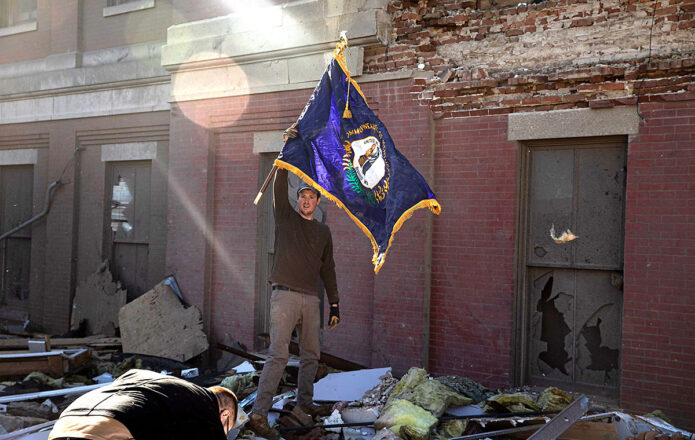 Kentucky state flag rescued from the rubble of the courthouse in Mayfield, KY. (Spc. Brett Hornback, 133rd Mobile Public Affairs Detachment) Kentucky state flag rescued from the rubble of the courthouse in Mayfield, KY. (Spc. Brett Hornback, 133rd Mobile Public Affairs Detachment)