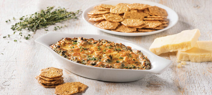 Serve this warm spinach and artichoke dip with crisp Crunchmaster® crackers for a party goer’s palate-pleaser.