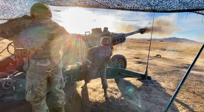 Cristina Taylor pulls the lanyard on an M777 Howitzer during BOLC in 2020. (APSU)