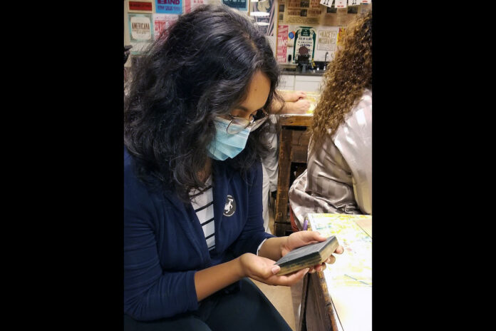 Dulce DelaRosa, Austin Peay State University marketing student, working on the project. (APSU)