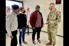 LifePoint Church Pastors (from left) Mark Benton, II, Christian Christenson and Willie Simpson with Col. Vincent B. Myers. (Maria Christina Yager, Blanchfield Army Community Hospital)