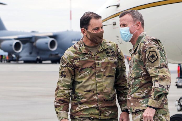 A paratrooper assigned to the Troop B, 5-73 Cavalry, 82nd Airborne Division trains a Polish soldier during a combined training event in Nowa Deba, Poland, Feb. 22, 2022. The 82nd Airborne Division is currently deployed to Poland to train with and operate alongside our Polish allies. The training allows allies to get to know each other’s equipment, capabilities and tactics to enhance readiness and strengthen the NATO alliance. (Army Master Sgt. Alexander Burnett)