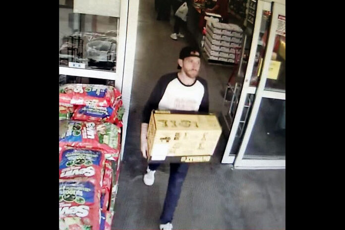 The Clarksville Police Department is trying to identify the man in this photo in connection to a vehicle burglary and fraudulent use of a credit Card.