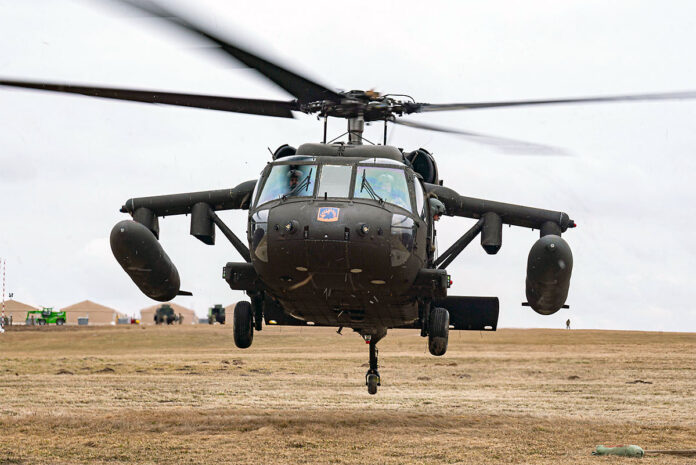 An Army UH-60 Black Hawk helicopter lands to refuel in Zamosc, Poland, March 5th, 2022. (Marine Corps Sgt. Claudia Nix)