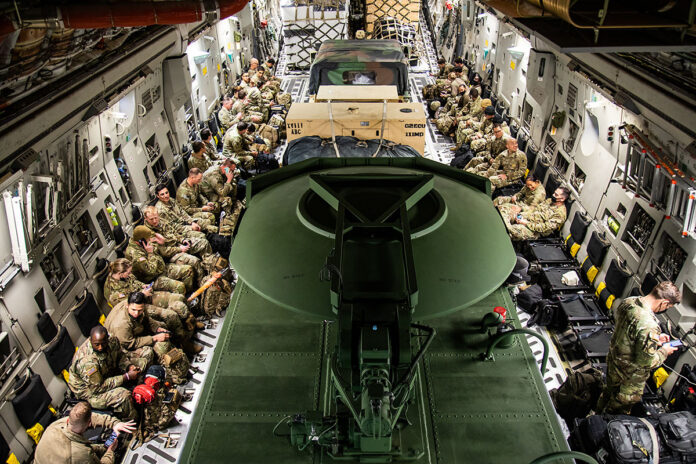 Paratroopers assigned to the 82nd Airborne Division prepare to depart Fort Bragg for the U.S. European Command area of responsibility at Pope Army Airfield, N.C., Feb. 3rd, 2022. A full brigade has deployed to the region in the wake of Russia’s invasion of Ukraine.