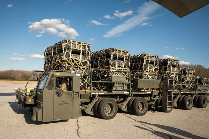 Pallets of ammunition, weapons and other equipment bound for Ukraine are processed through the 436th Aerial Port Squadron at Dover Air Force Base, Del., February 10th, 2022. (Mauricio Campino, Air Force)