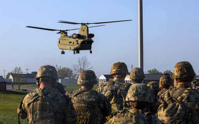 101st Airborne Division soldiers board a Chinook to be taken to Operation Lethal Eagle II. (Spc. Laura Hardin)