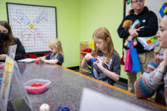 Lily Dunn, center, creates a clay model of the coronavirus. (APSU)